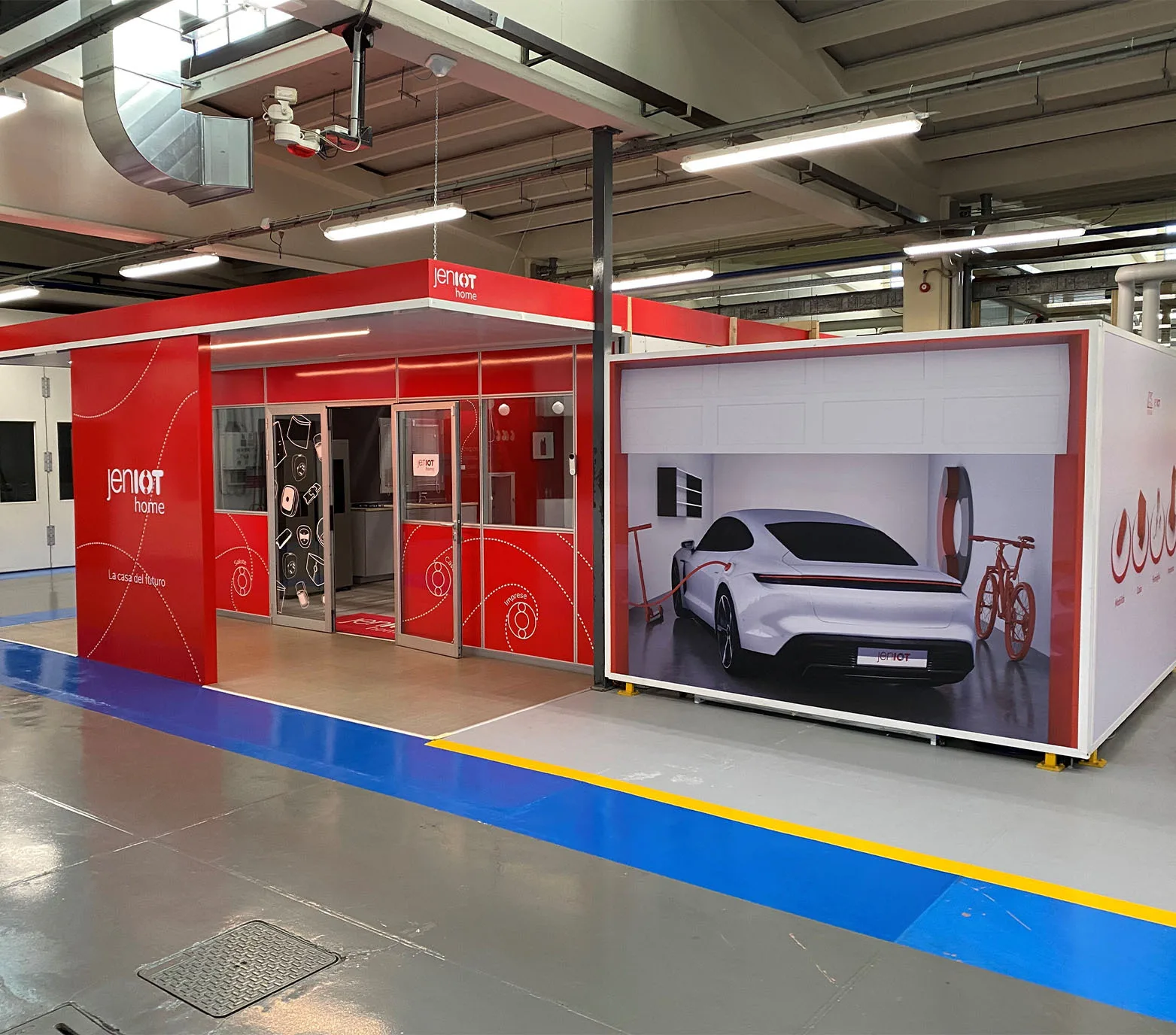 Spazio espositivo Jeniot Home con area casa e garage dimostrativo.